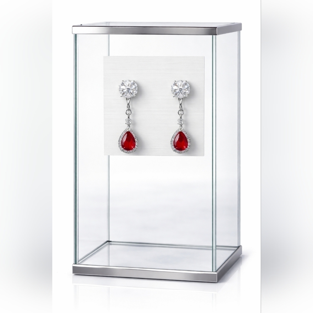 Silver plated ruby teardrop earrings.